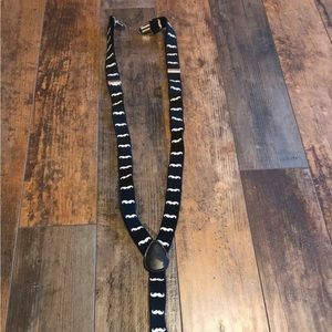 Girls Claire’s black moustache suspenders